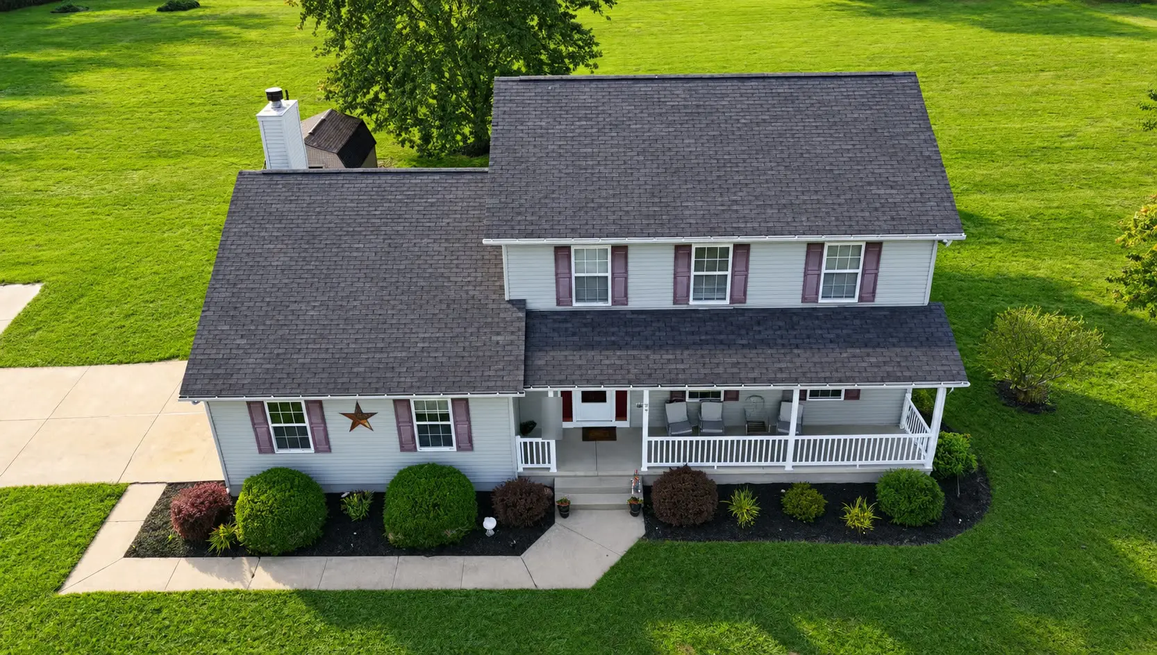 Drone Photography & Aerial Imaging 4 Top-down drone photo of a home roof and front porch for inspection